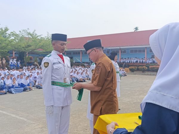 PENYAMBUTAN PETUGAS PENGIBAR BENDERA (PASKIBRA) PERWAKILAN SMA NEGERI 2 SUNGAI PENUH